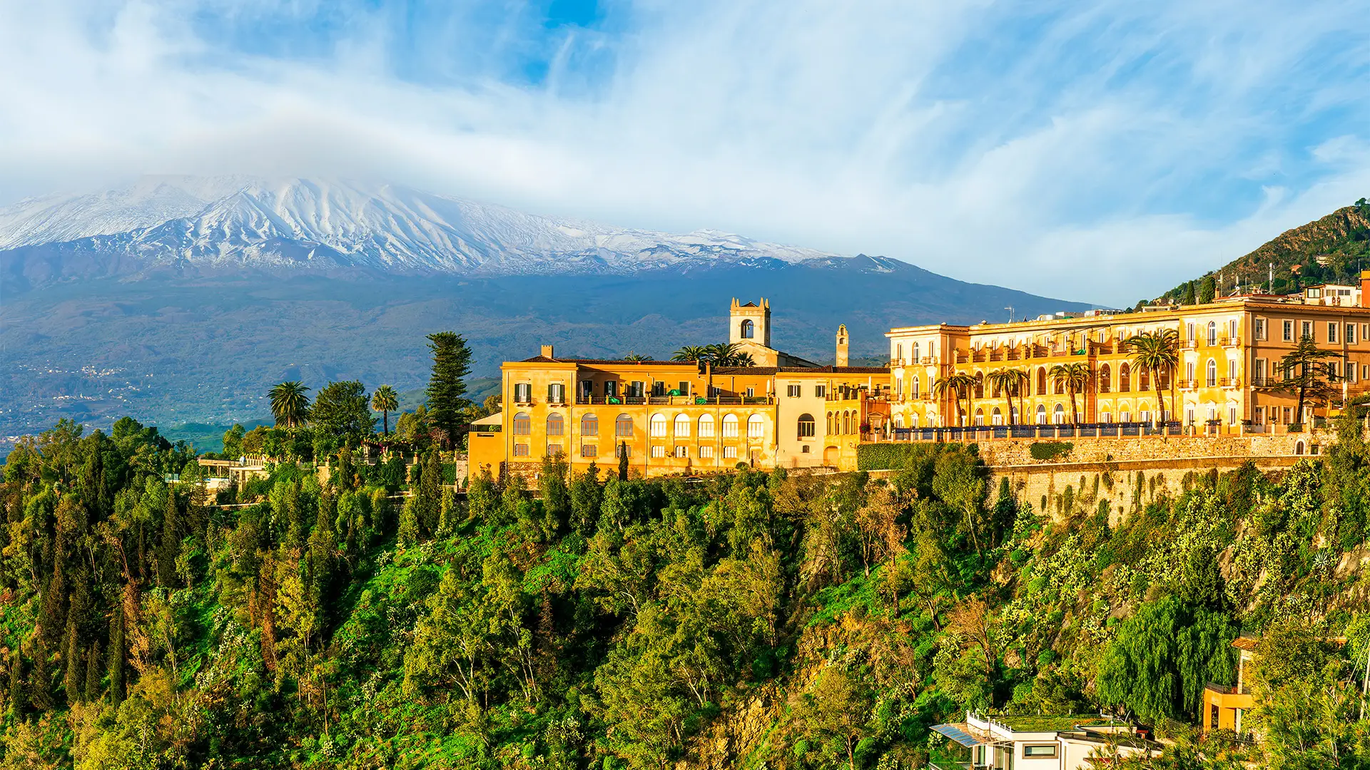 A View of a massive building in the hills of Taormina, Italy