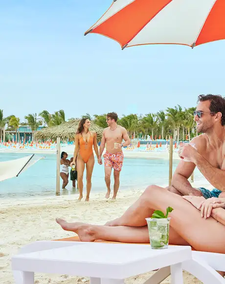 Multiple Couples relaxing at the beach