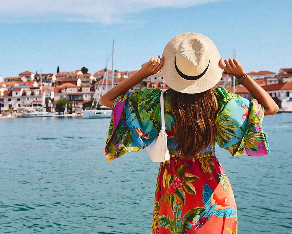A Woman on a Shore excursion as a part of a Virgin Voyages Cruise Holiday