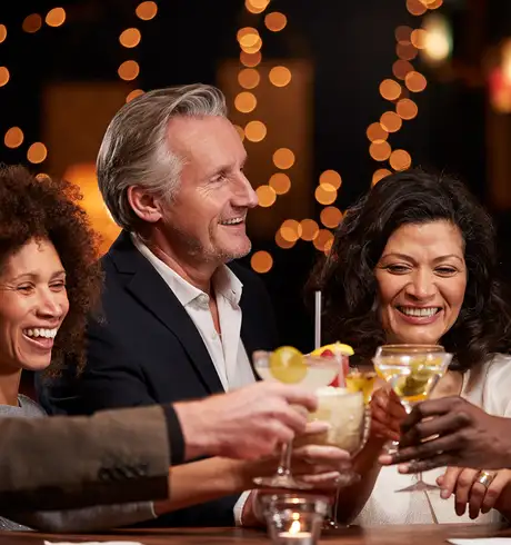 Friends having a drink at a bar