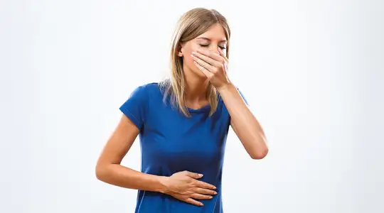 A Woman feeling sick