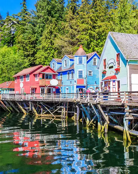 A view of the Historic Broadwalk in Ketchikan, Alaska. Showing multiple colourful houses.