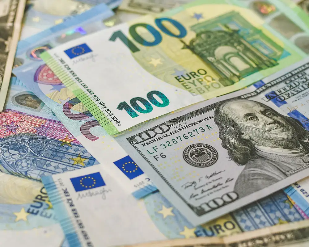 Dollars and Euros in a pile