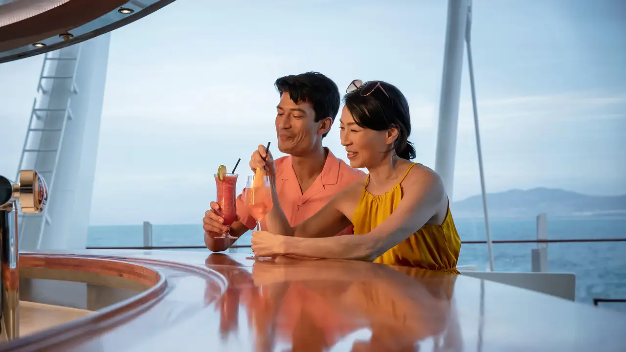 A Couple enjoying drinks on a P&O Ship