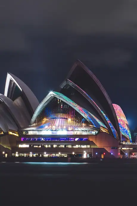 Sydney Opera House lit up at night