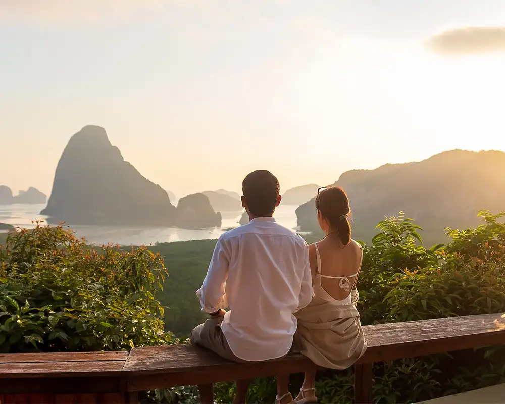 A Couple looking over Samet Nang She near Phuket, Thailand