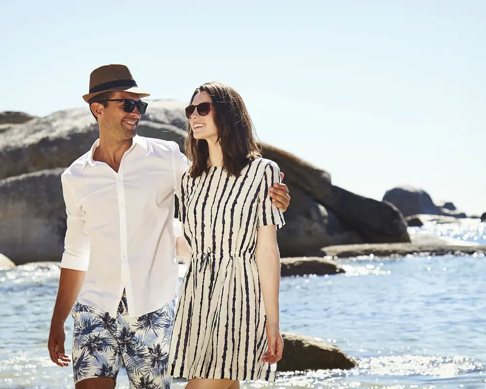 A Couple walking on beach