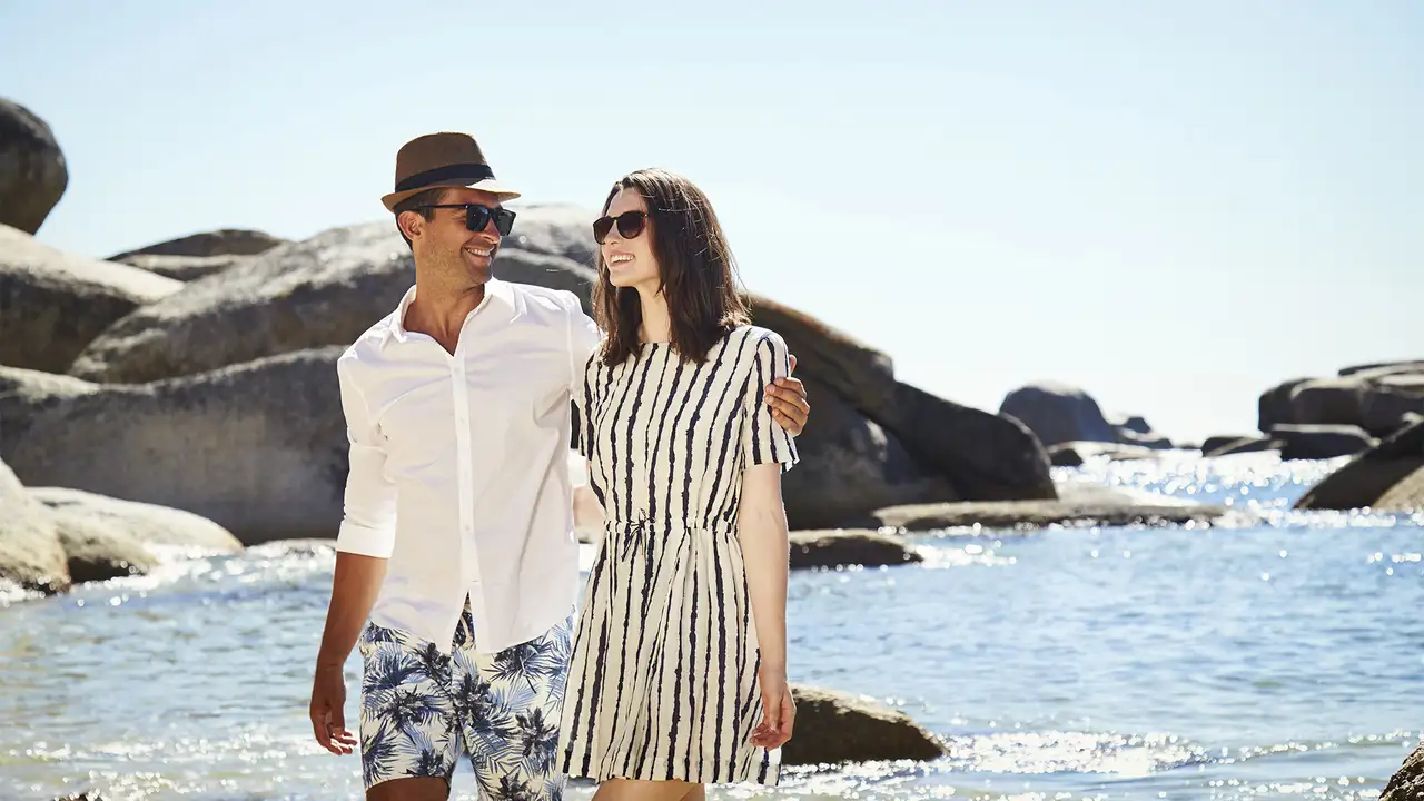 A Couple walking on beach