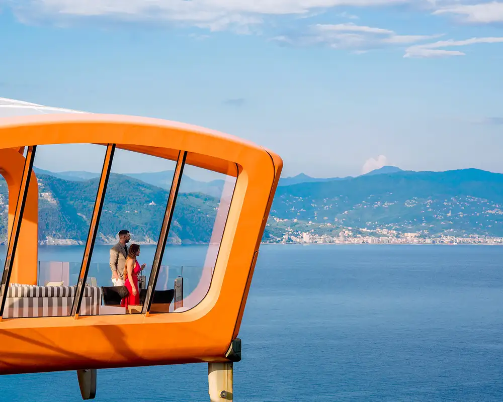 A Couple inside the magic carpet aboard a Celebrity cruise ship