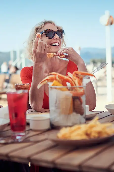 People enjoying a meal at the Lido aboard Cunard Ships
