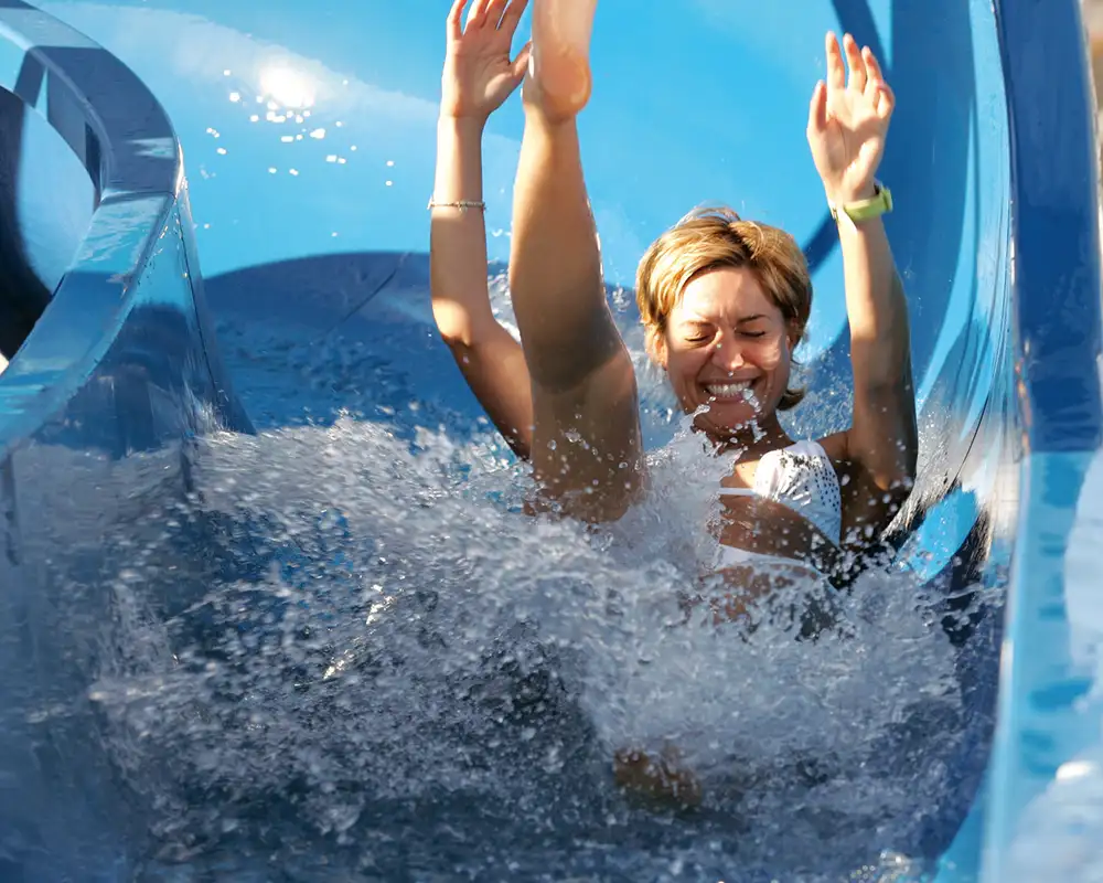 A Woman going down a water slide aboard a Costa Cruise Ship