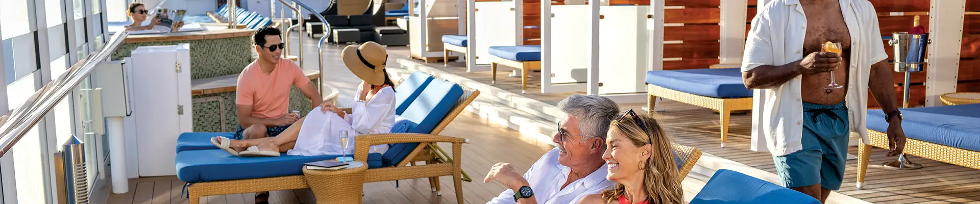 People relaxing on the sundeck of an NCL ship