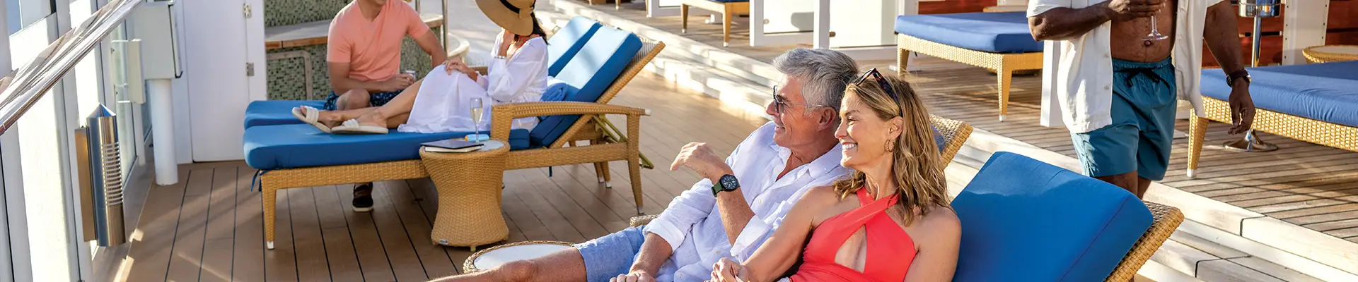 People relaxing on the sundeck of an NCL ship