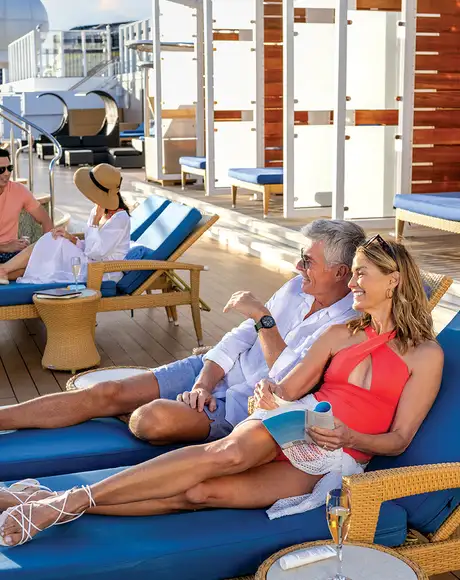 People relaxing on the sundeck of an NCL ship