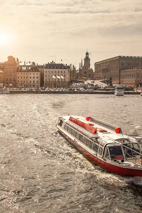 A boat sailing through the rivers of Stockholm