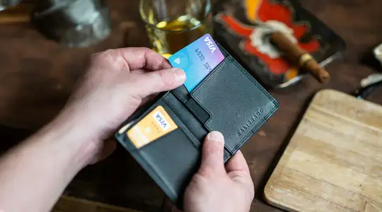 A person paying with a credit card