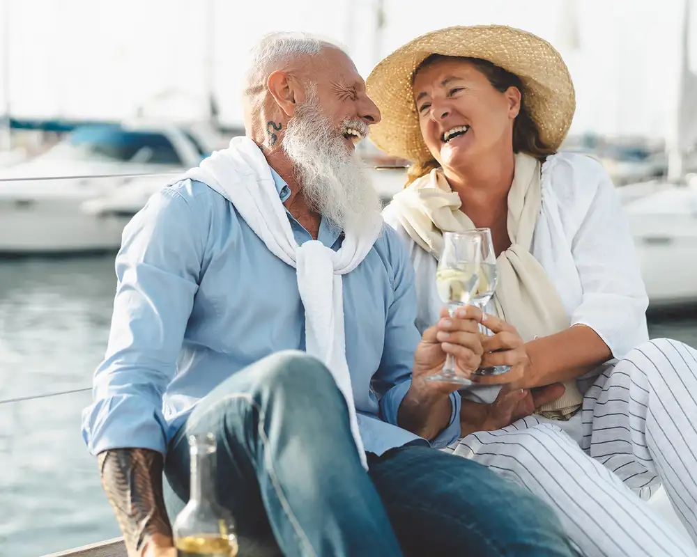 An old couple enjoying drinks