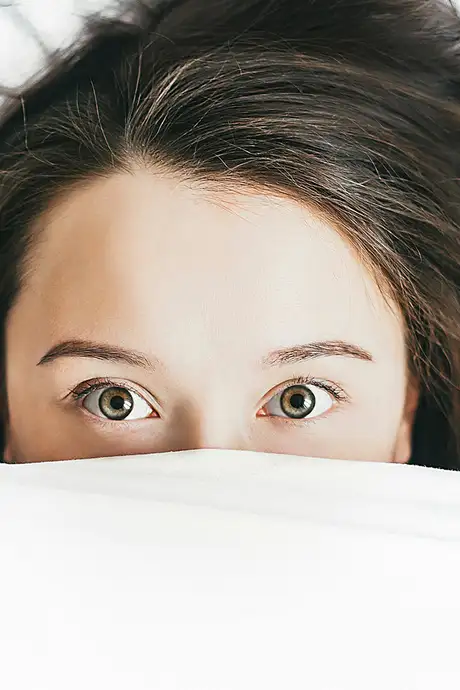 A woman with trouble sleeping