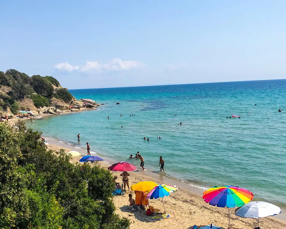 A beach full of people in Halkidiki