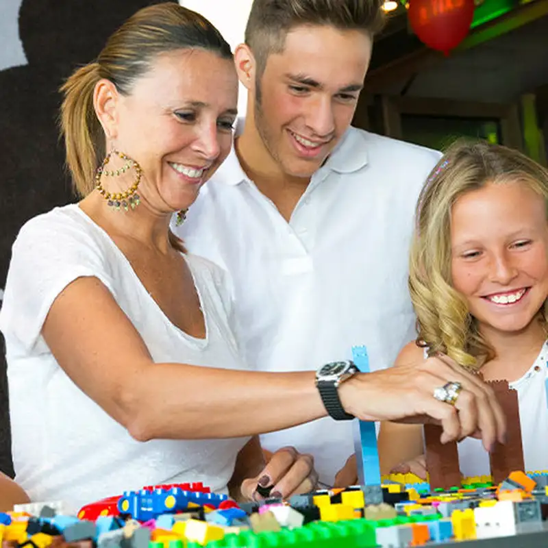 A Family playing with Lego