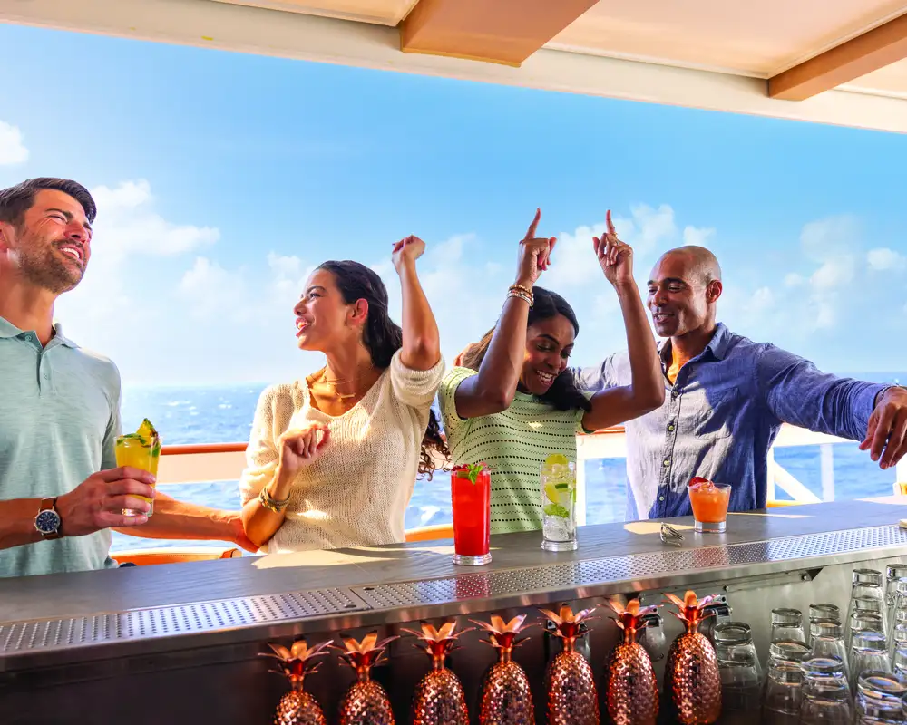 Ordering drinks at the bar on a cruise ship