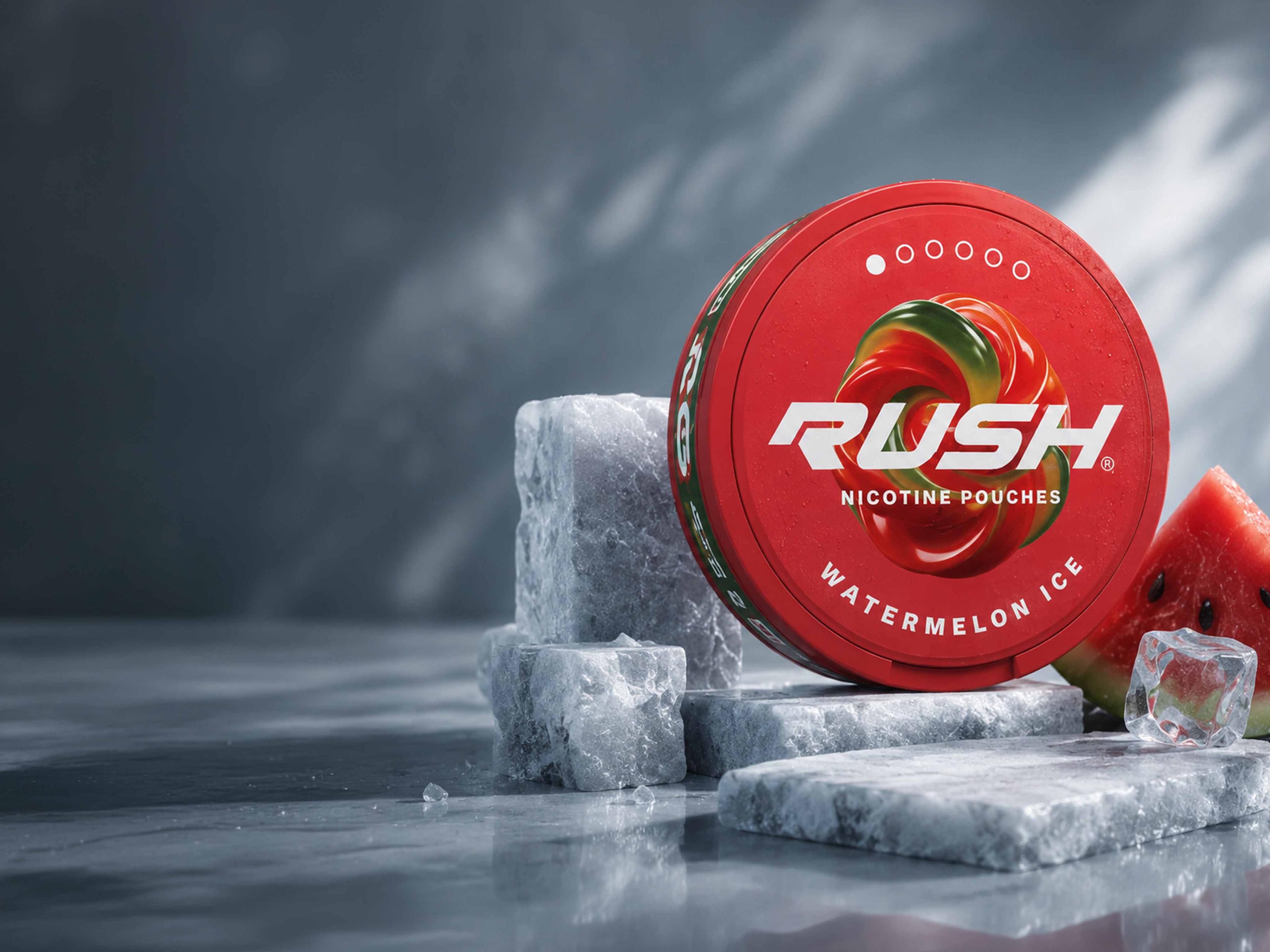 Red tin of Rush Watermelon Ice nicotine pouches on icy marble slabs beside a watermelon slice and ice cube.