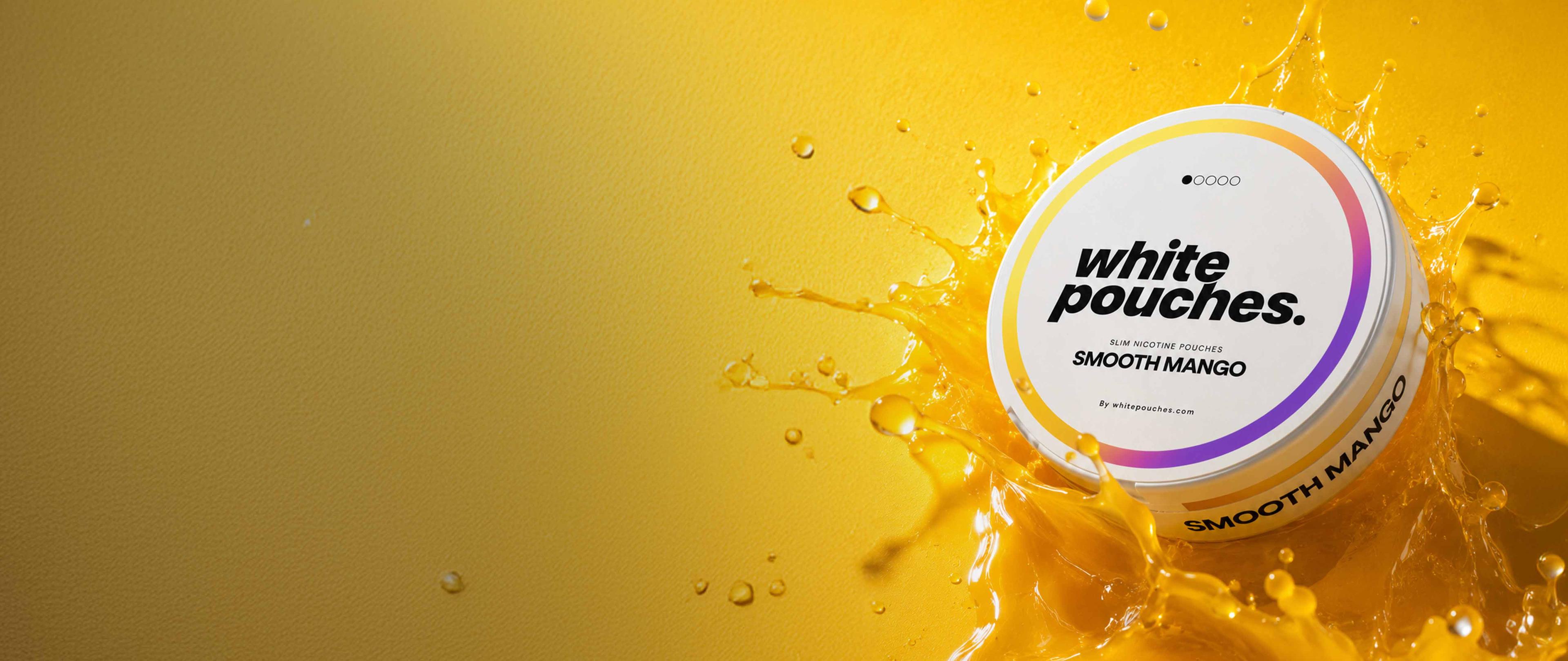 White pouches container labeled "Smooth Mango" with a splash of yellow liquid against a vibrant yellow background.