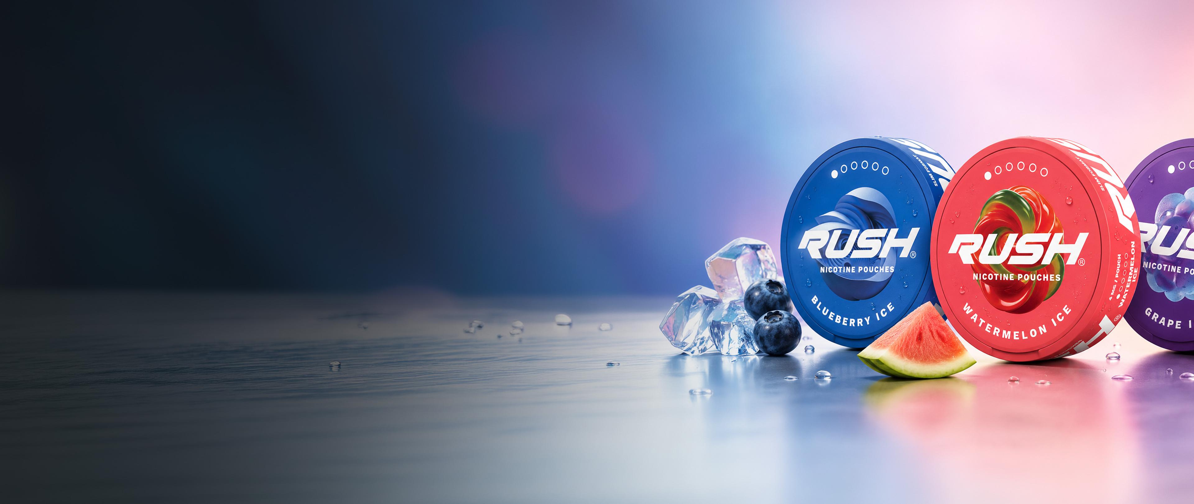 Three colorful cans of Rush nicotine pouches in flavors: Blueberry Ice, Watermelon Ice, and Grape Ice, surrounded by ice cubes, blueberries, and watermelon.