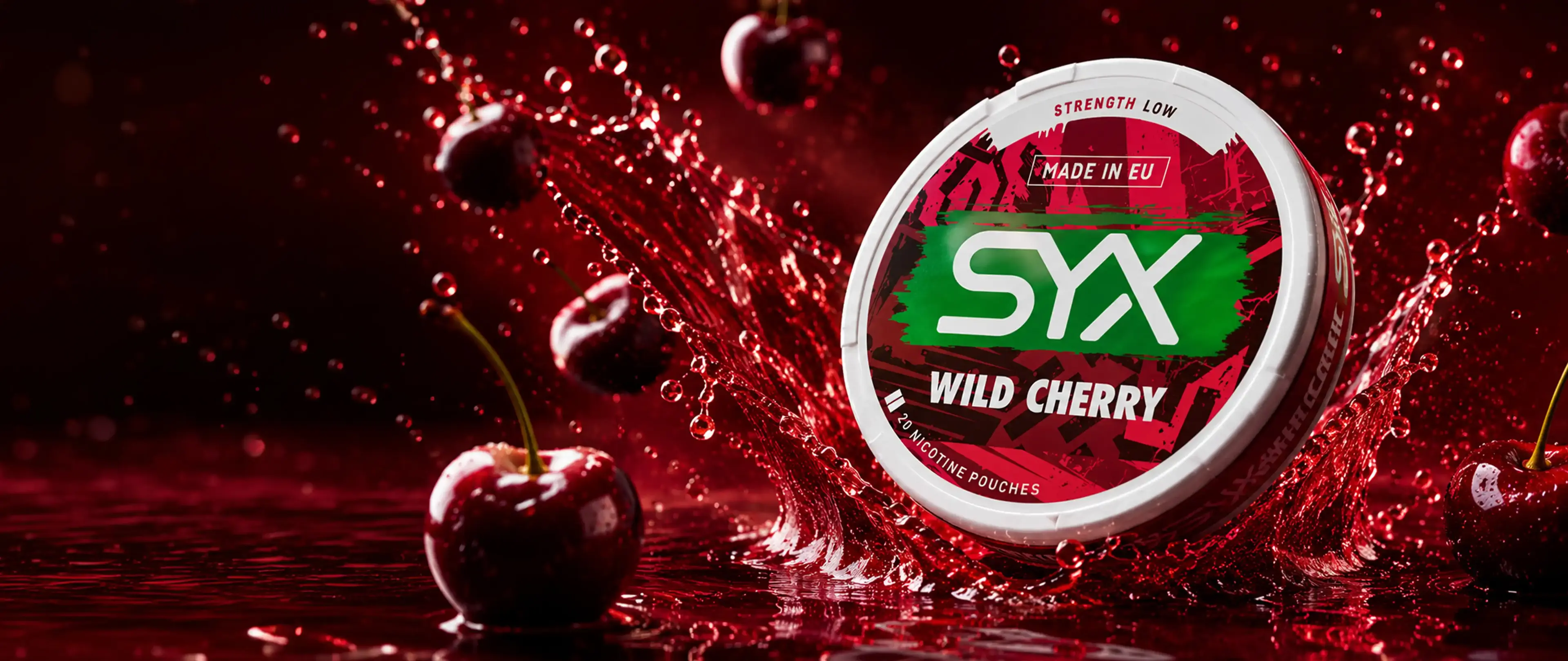 SYX Wild Cherry nicotine pouch submerged in cherry juice splash with fresh cherries floating around on a dark red background.