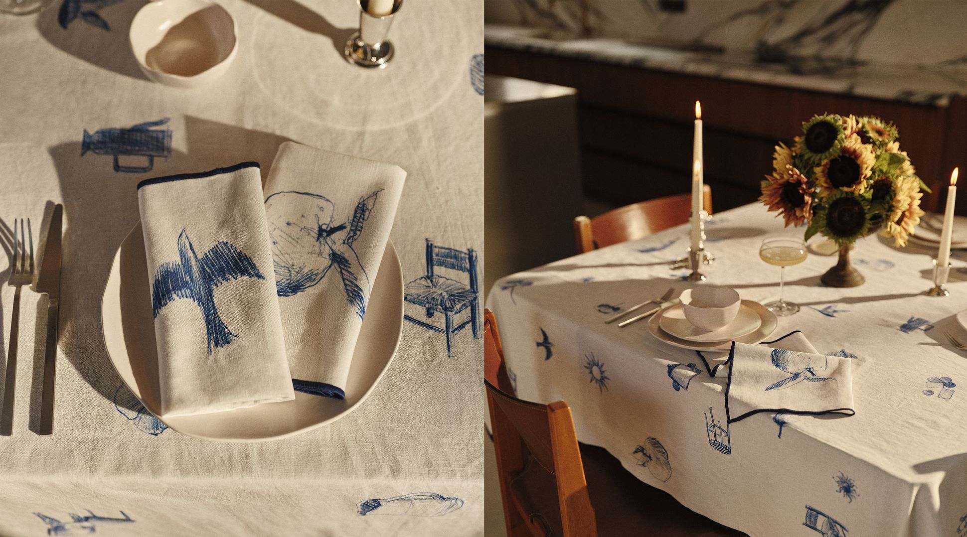 Une table élégamment dressée, avec une nappe blanche ornée de motifs bleus, une bougie allumée, un centre de table composé de tournesols, de la vaisselle et des verres.