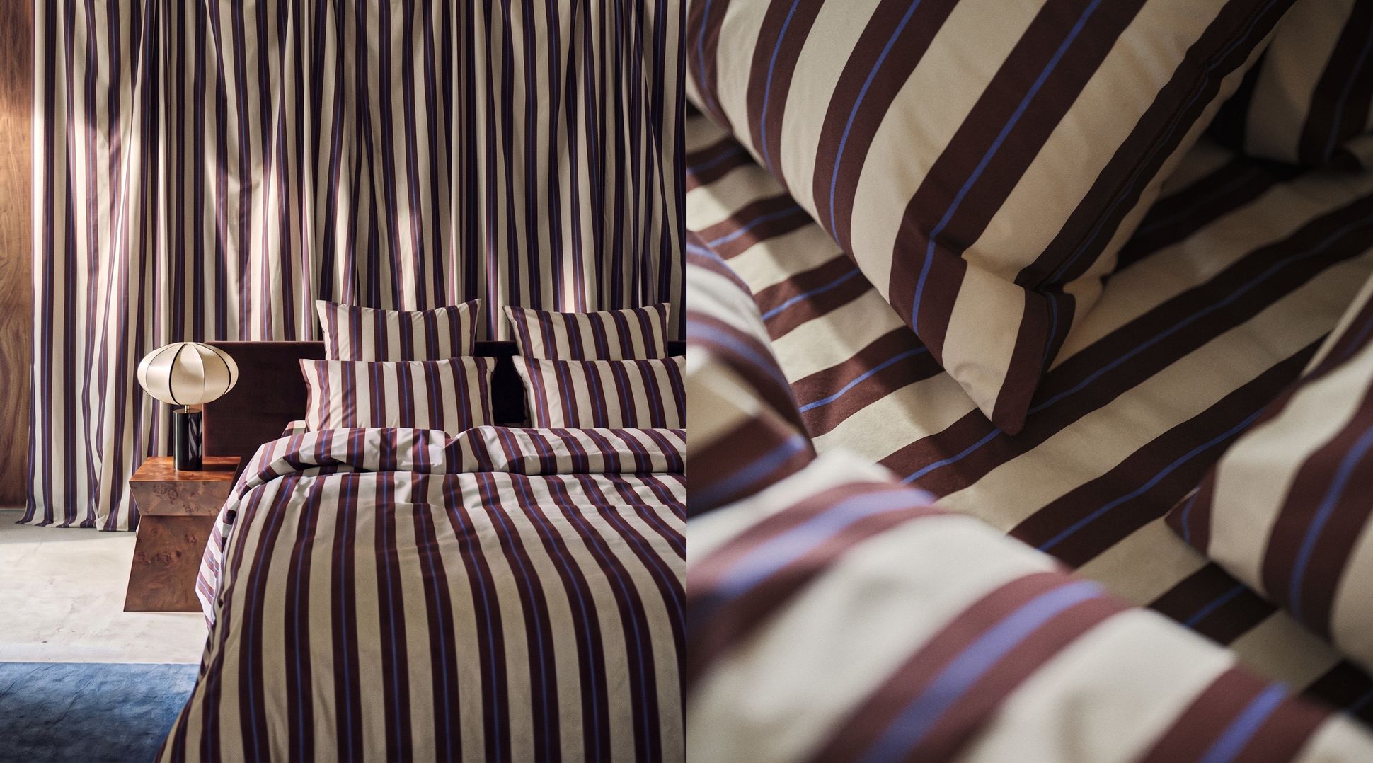 Une chambre avec une parure de lit à rayures marron et crème et des rideaux assortis, une table de chevet en bois et une lampe décorative. Gros plan sur le tissu.