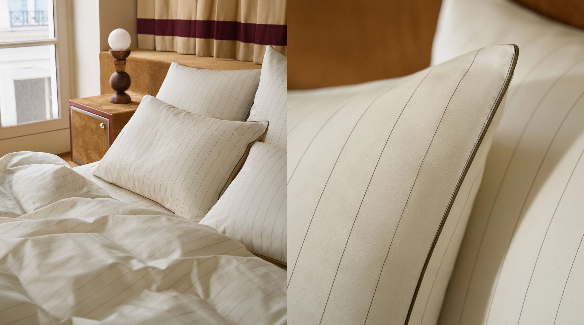 Lit avec des draps et des oreillers rayés blanc crème, à côté d'une table de chevet en bois avec une lampe ronde. Gros plan sur le détail du tissu de l'oreiller.