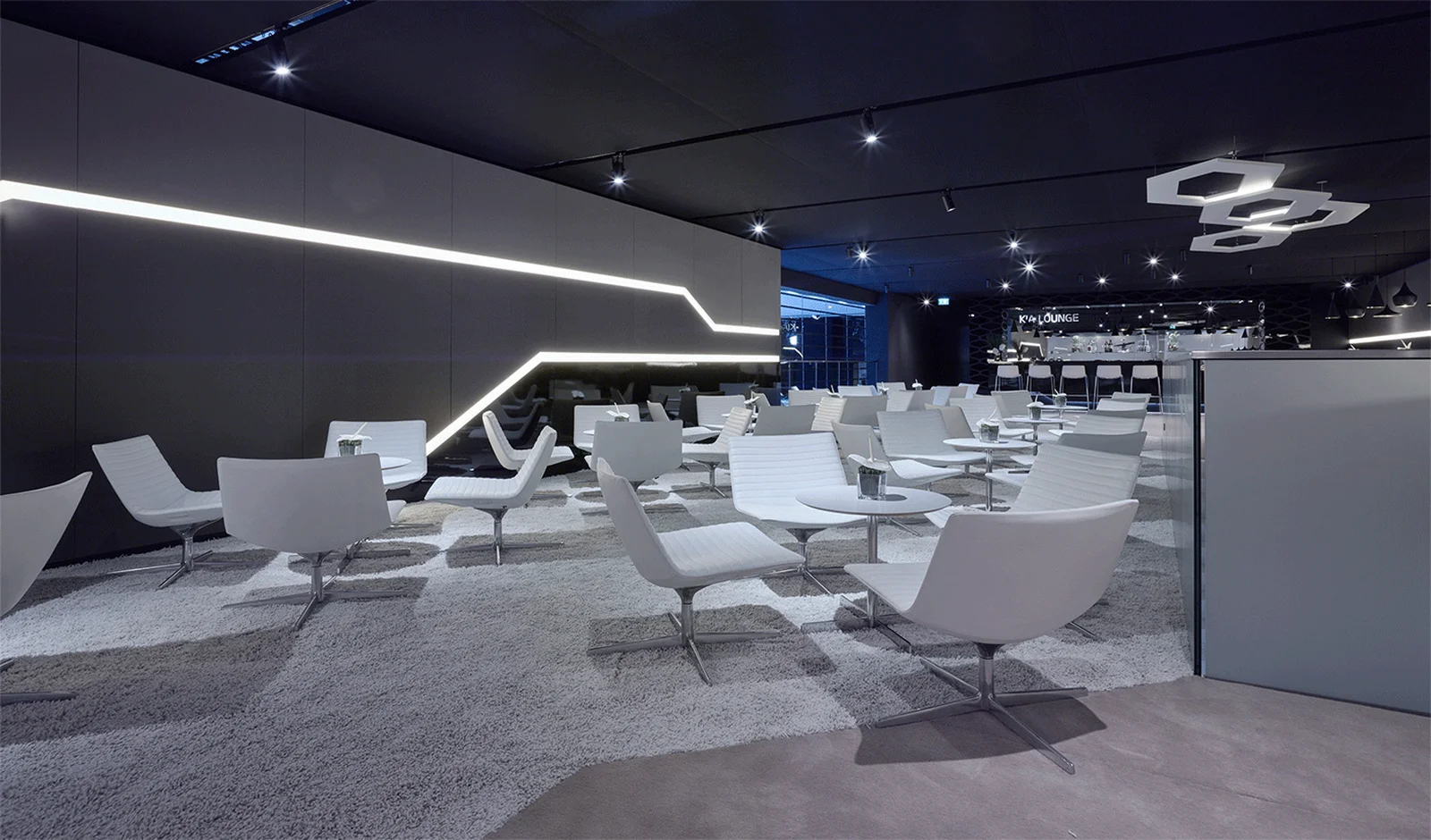 Kia exhibition booth at the Geneva Motor Show 2015 featuring modern car displays and innovative designs.