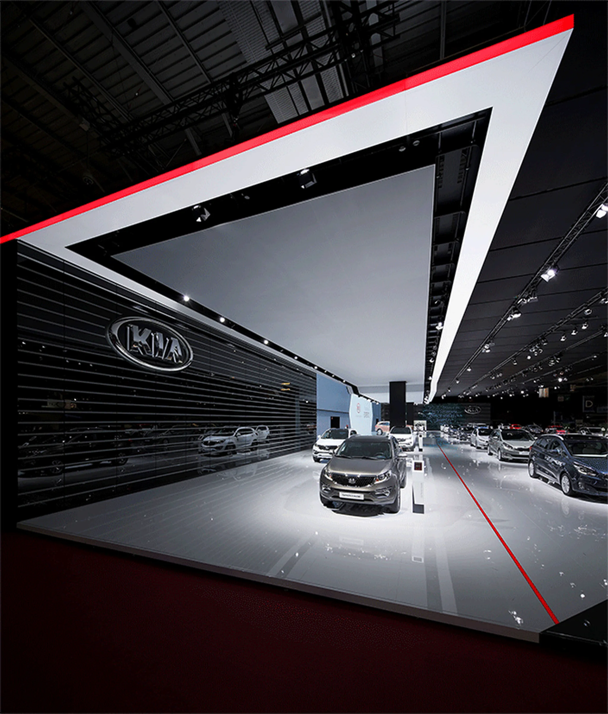 Kia exhibition booth at the Geneva Motor Show 2015 featuring modern car displays and innovative designs.