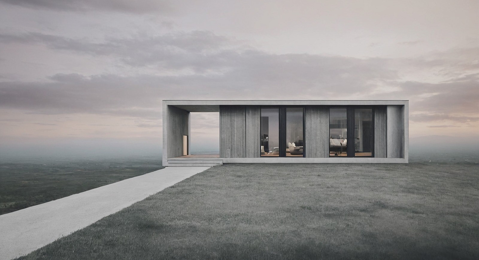 Ein modernes Haus mit einem Flachdach und großen Fenstern, gelegen auf einem Grasfeld mit einem Weg, der zum Eingang führt.