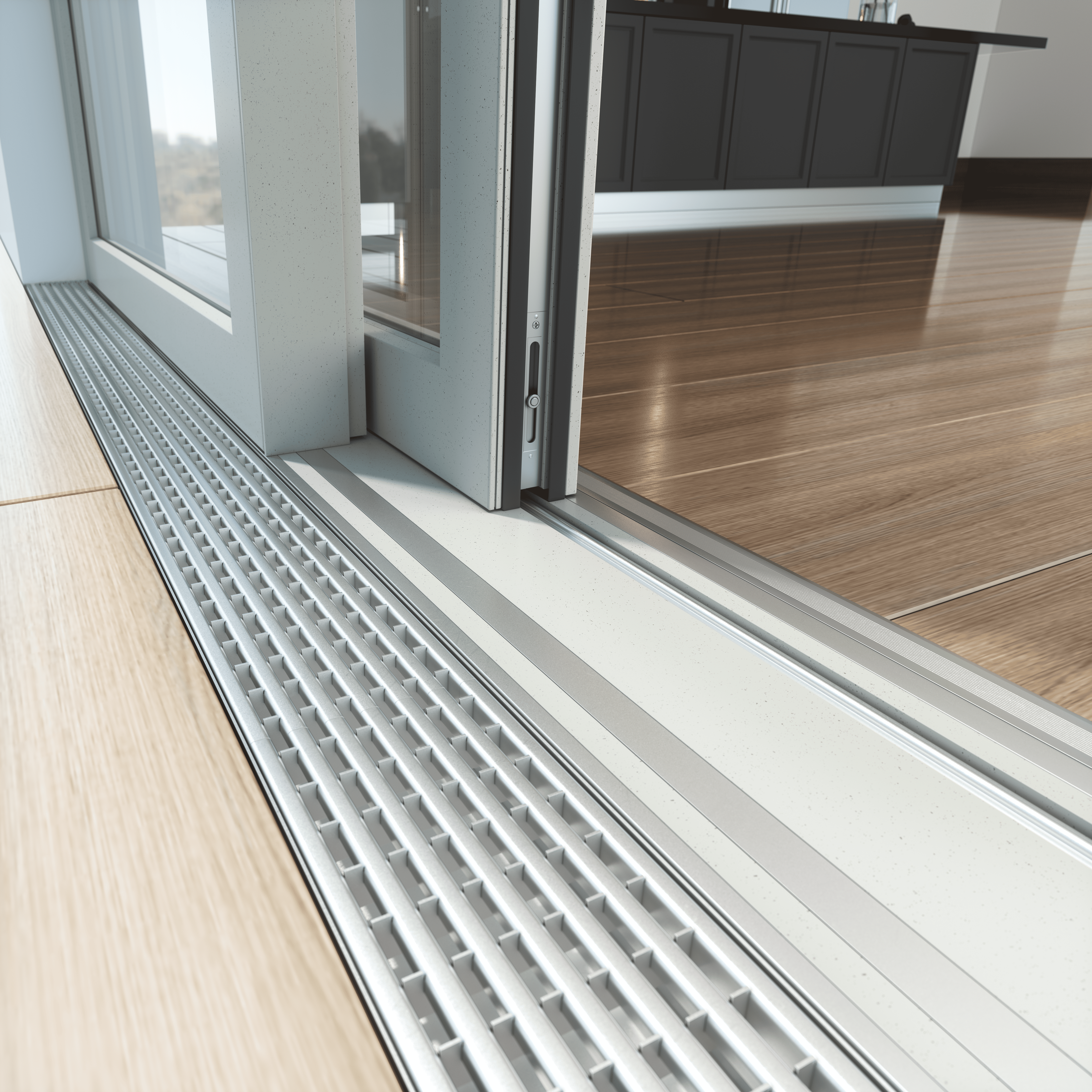 A close-up view of a sliding glass door with a metal threshold and a wooden floor.