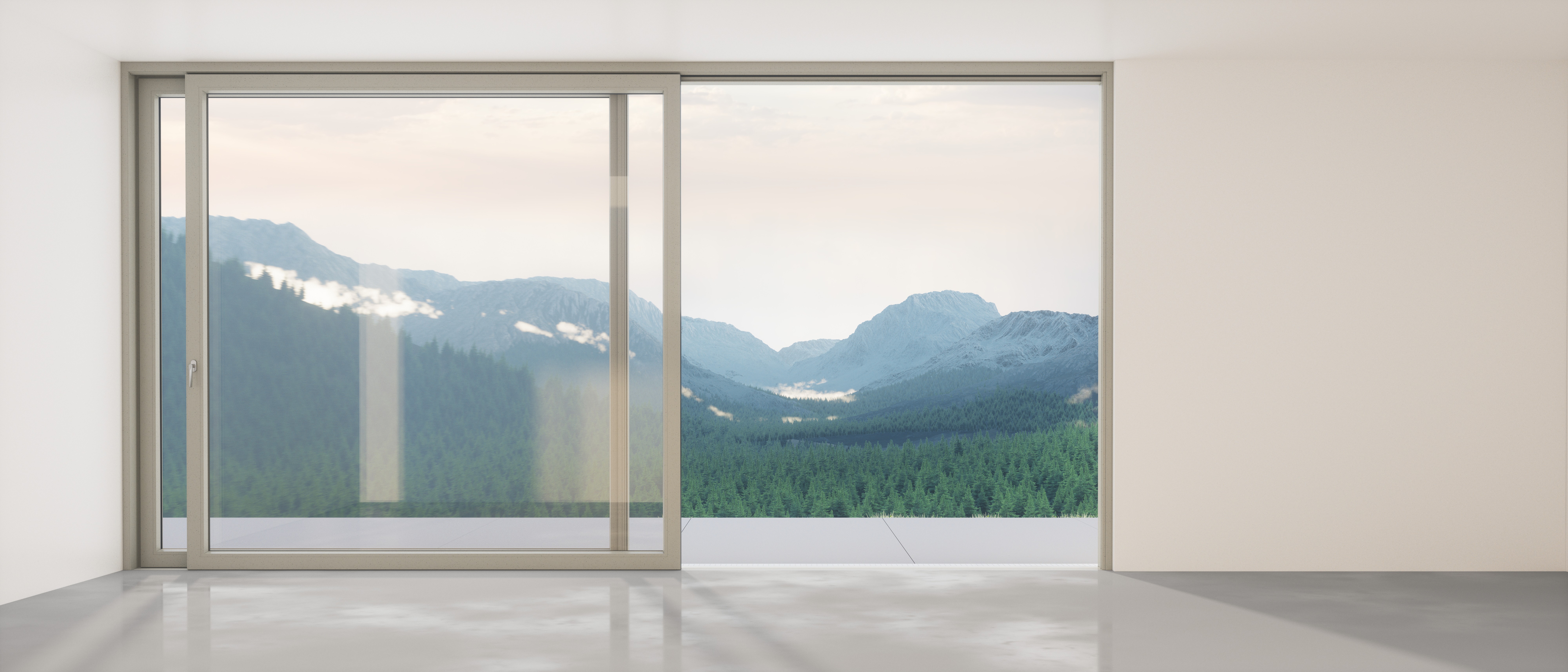 Sliding glass doors with a view of a mountain range and a forest of trees.