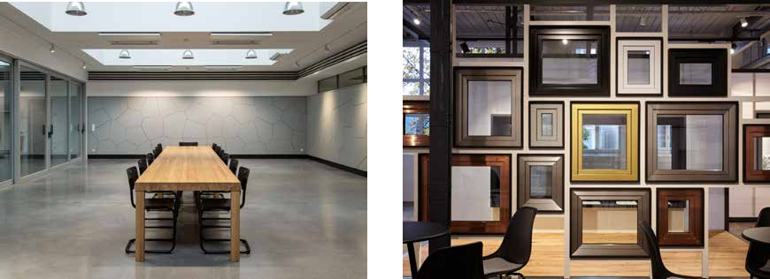 Left: A modern conference room with a long wooden table and eight chairs. Right: A wall display of assorted empty picture frames.