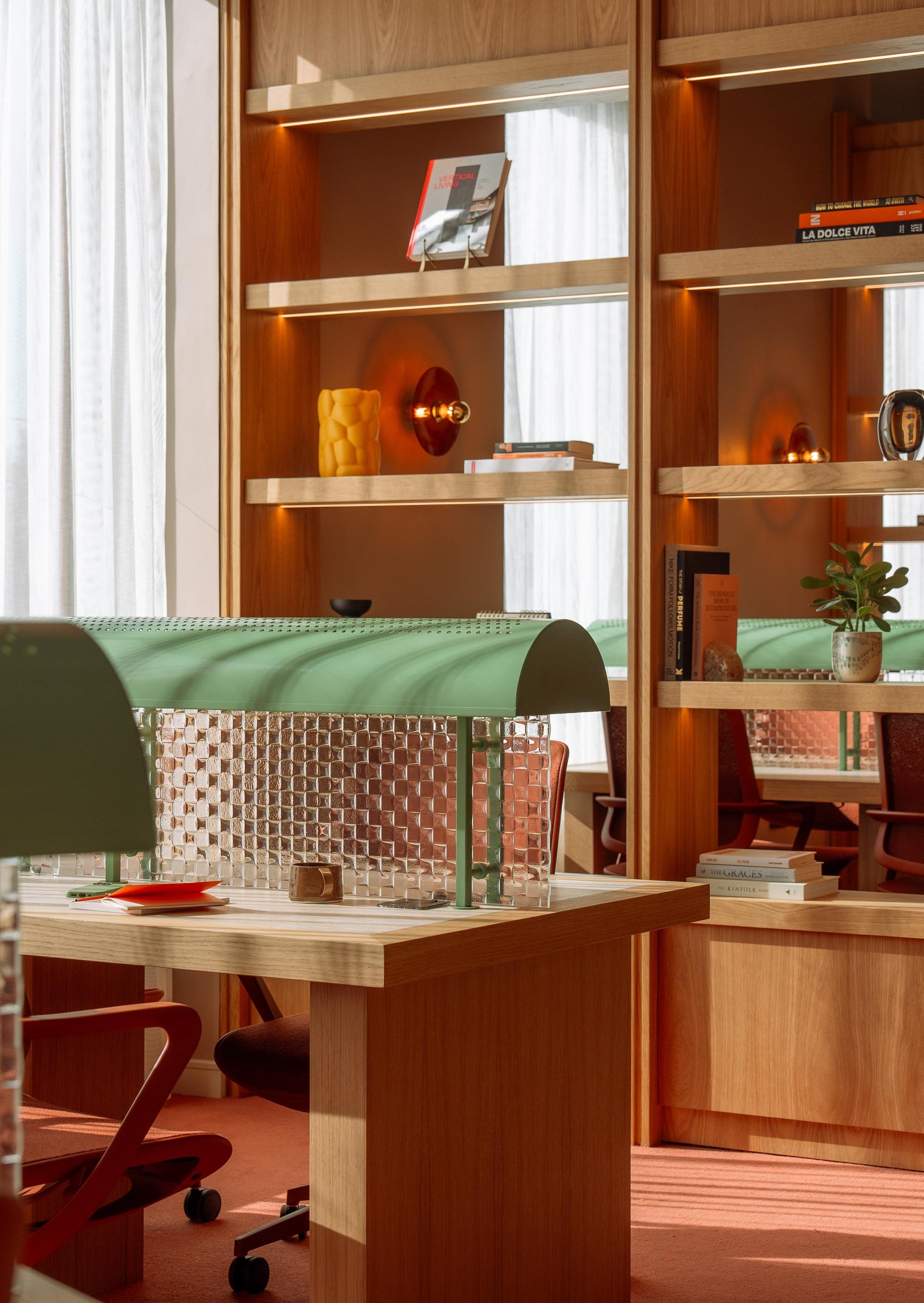 Image of co-working space with wooden shelving at The Eades luxury apartments to rent. [G]