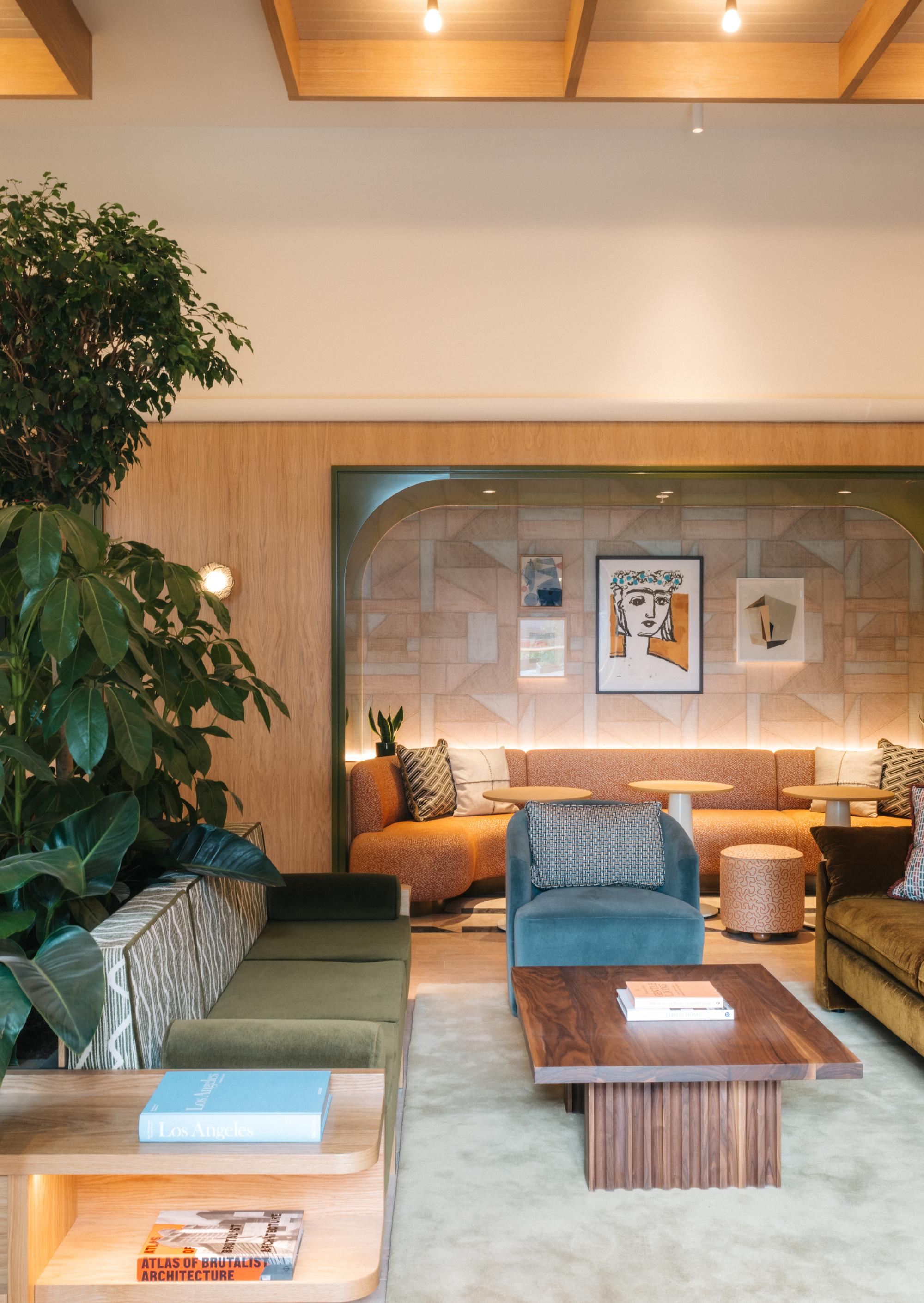 Image of stylish communal lounge with plush sofas at The Eades luxury apartments to rent. [G]