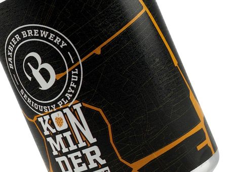 Close-up of a dark beer can with orange geometric design and “Baxbier Brewery, Seriously Playful” and “Kon Minder” text on the label.