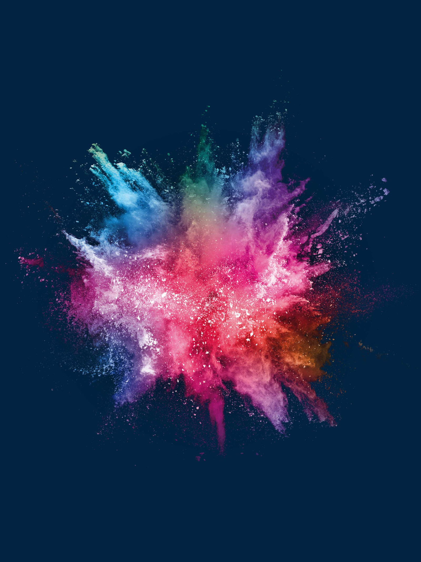Vibrant explosion of metallic powder representing AlMgty® aluminum alloy, symbolizing innovation and high-performance material development