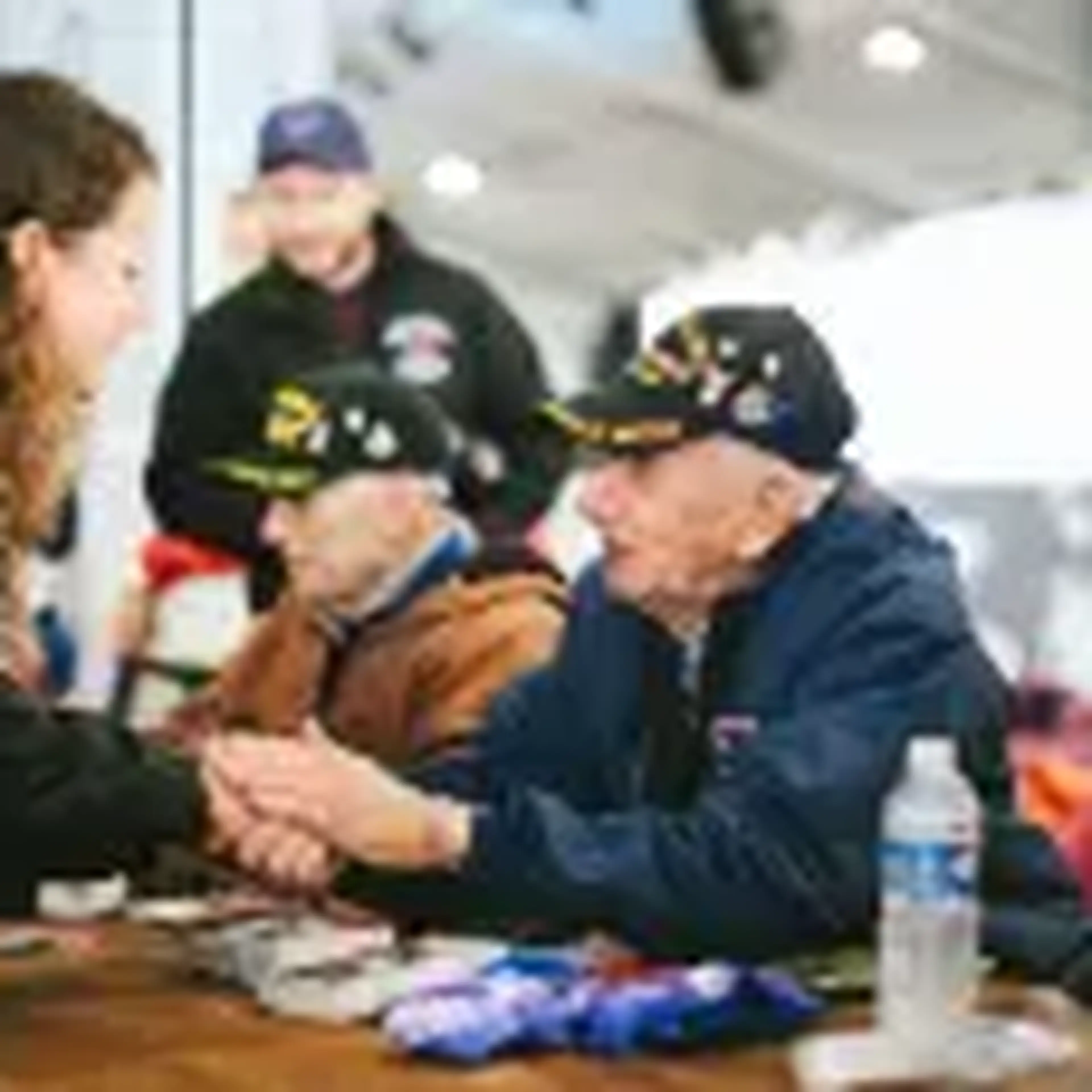 veteran talking to student