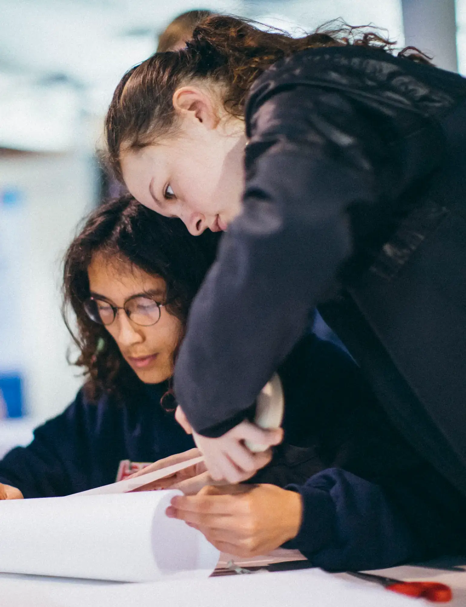 Two students studying on tour