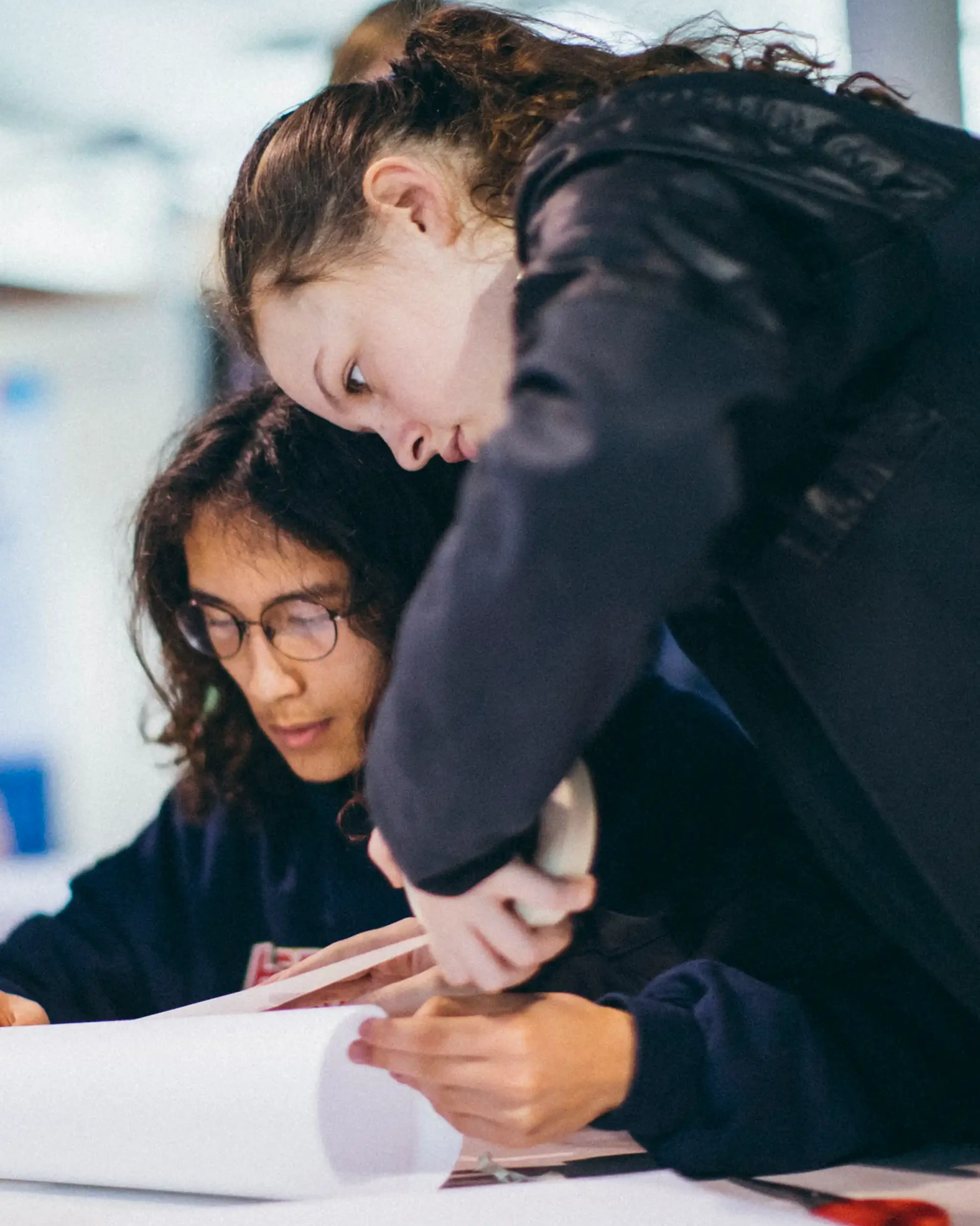 Two students studying on tour