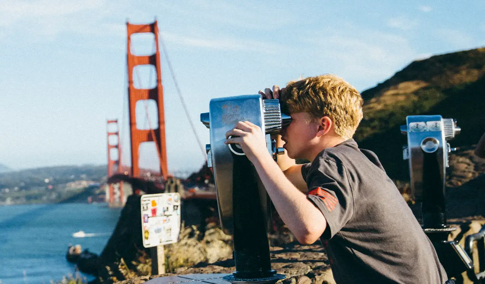 Student on tour visiting Golden Gate Bridge
