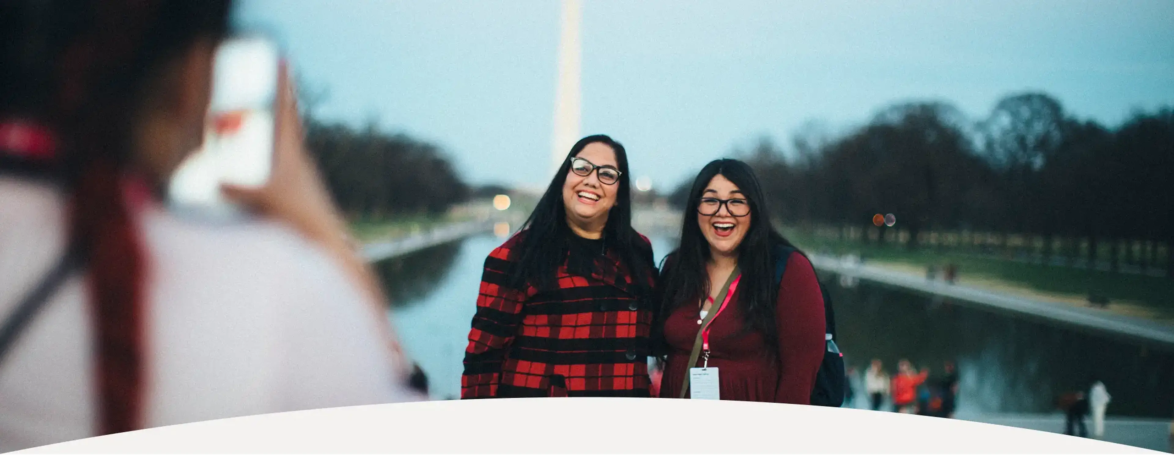 two teachers in front of the Washington Monument