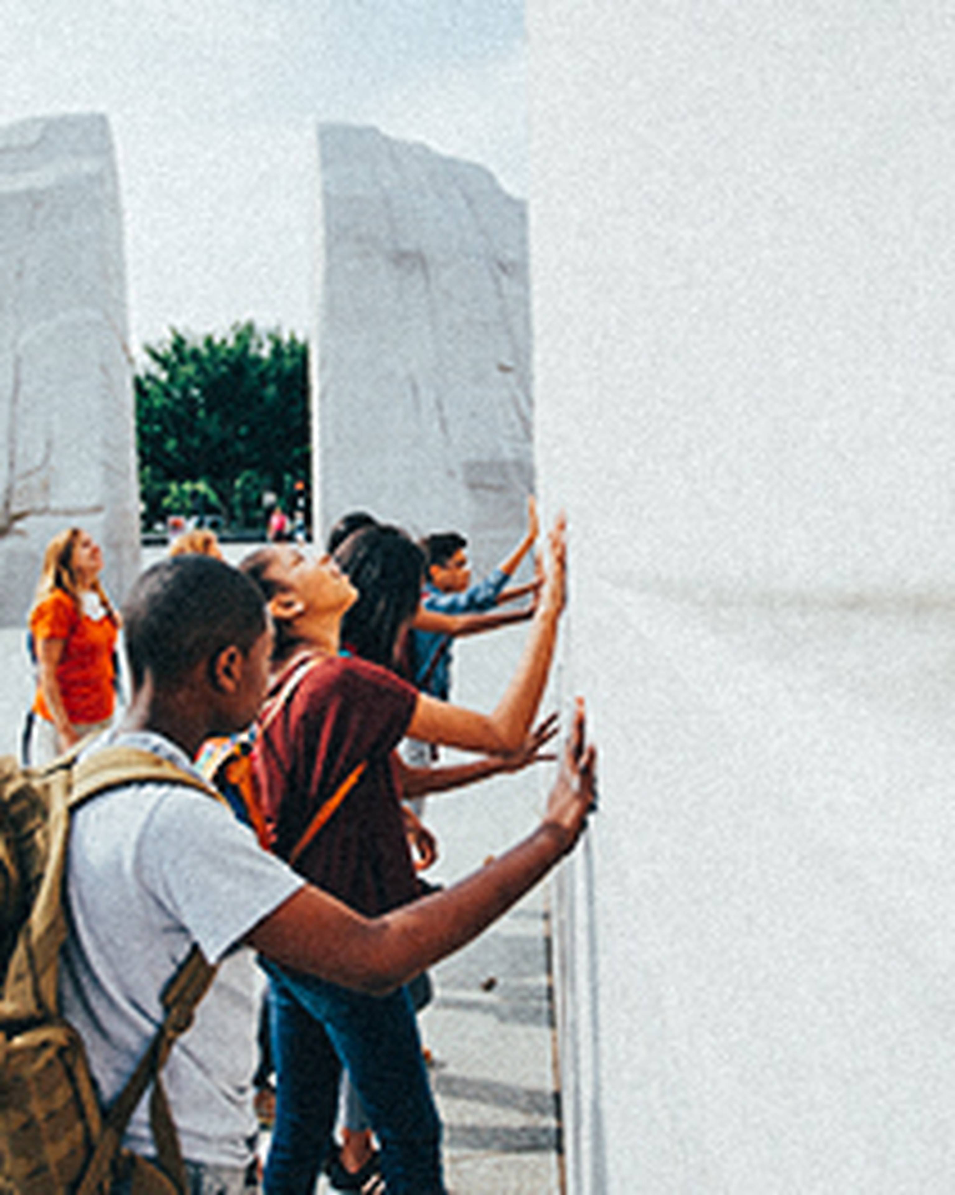 students at a monument