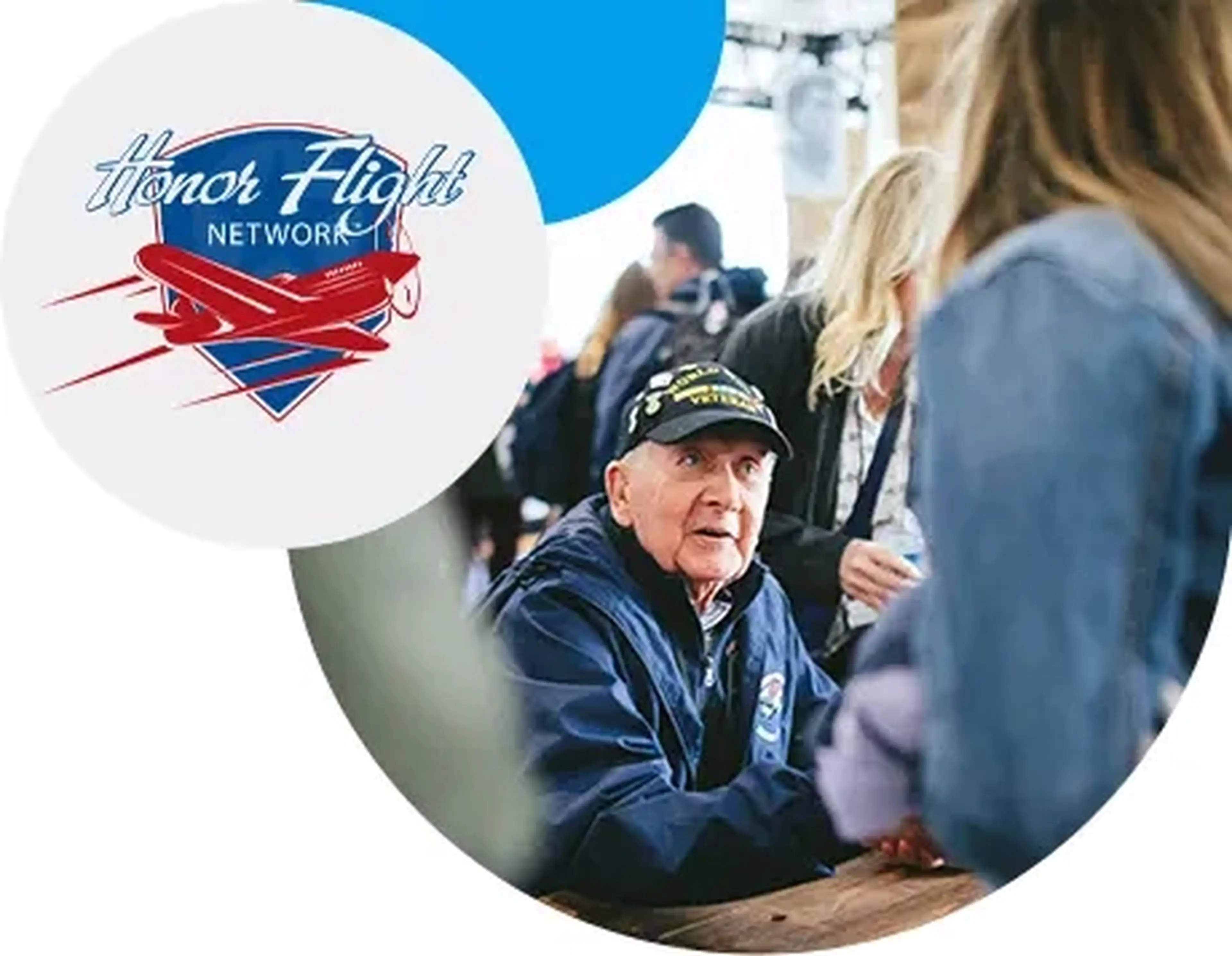 veteran with honor flight talking to a student
