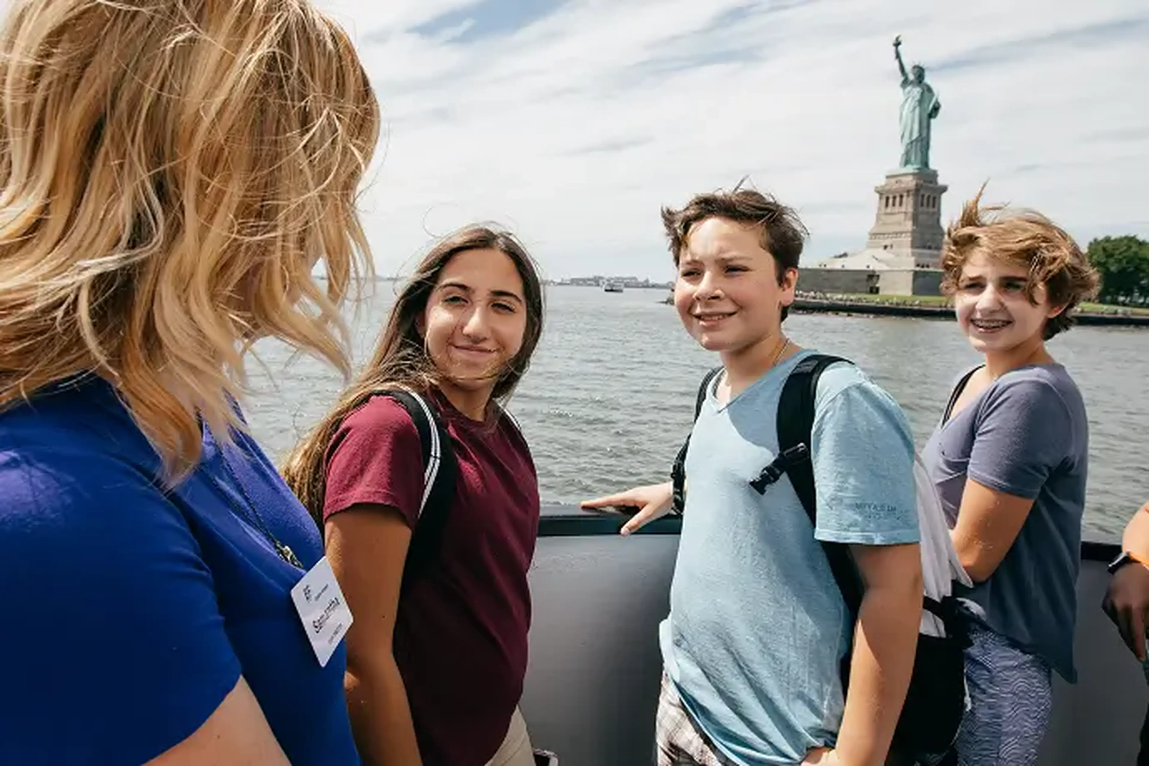 travelers visiting the Statue of Liberty